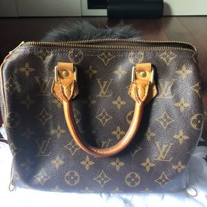 Authentic Louis Vuitton SPEEDY 25 monogram bag.